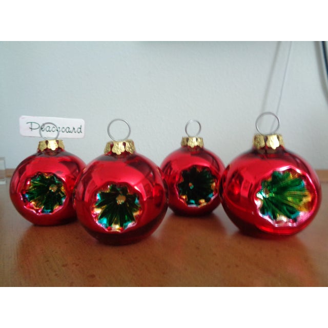 Set of 4 Christmas Mercury Glass Place Card Holders. Each is blown mercury glass in a brilliant shade of red. In the...