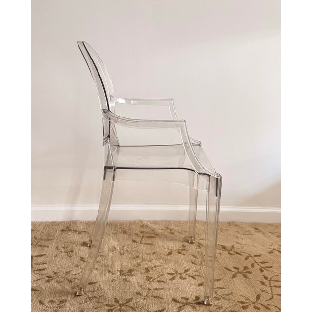 Authentic Louis Ghost armchair designed by Philippe Starck for Kartell. Clear polycarbonate construction with molded...