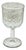 A set of four pressed glass goblets featuring a classic grape and vine motif with a thumbprint texture and botanical...
