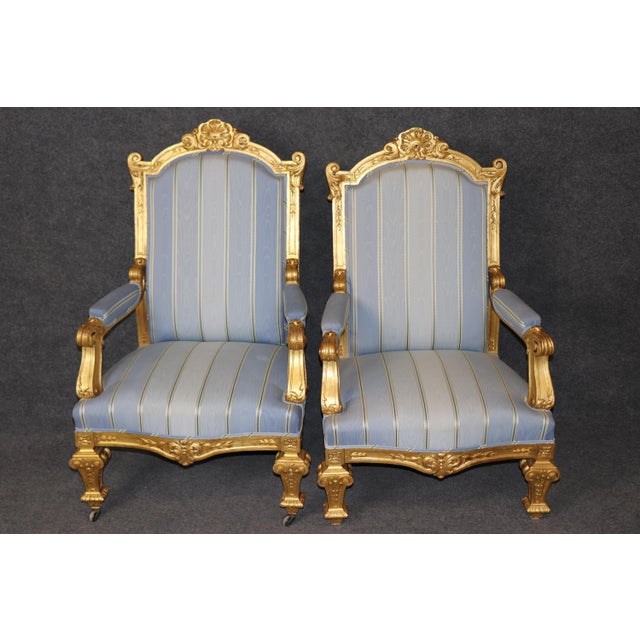 Dimensions: 44.75 inches high x 29.25 inches wide x 29.25 inches deep. Seat Height 17 An exceptional pair of vintage Louis...