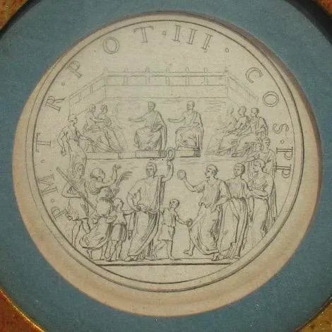 Vintage wall decoration of a circular gilt-framed bookplate. The imagery of the Roman Republic with a border of Roman...
