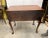 A classic Centennial hand carved mahogany lowboy. The hand carved details on the front, the gadrooned edge at the top and...