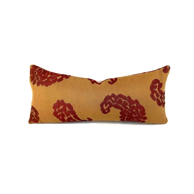 From Scalamandre is Katmandu in Gold and Red pillow cover. This pillow features red paisley designs on a dark gold...