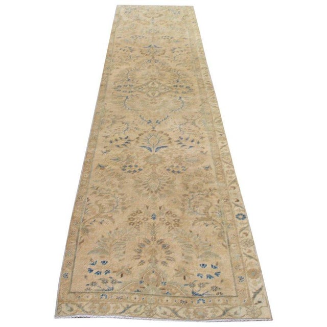 Hand-knotted with care using traditional rug-making techniques, this wool rug blends timeless craftsmanship with a modern...