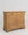 A French oak buffet with a rectangular form and paneled doors. The design is straightforward, focusing on structure and...
