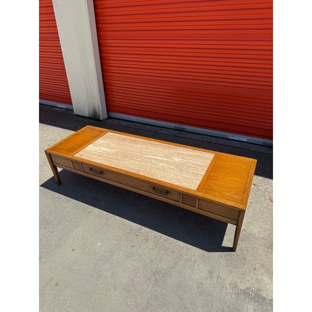 Vintage Drexel Walnut & Travertine Coffee Table Featuring a straight line design, center solid travertine insert, single...
