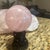 Polished Rose Quartz Crystal Sphere on Carved Pedestal Stand For Sale - Image 4 of 4