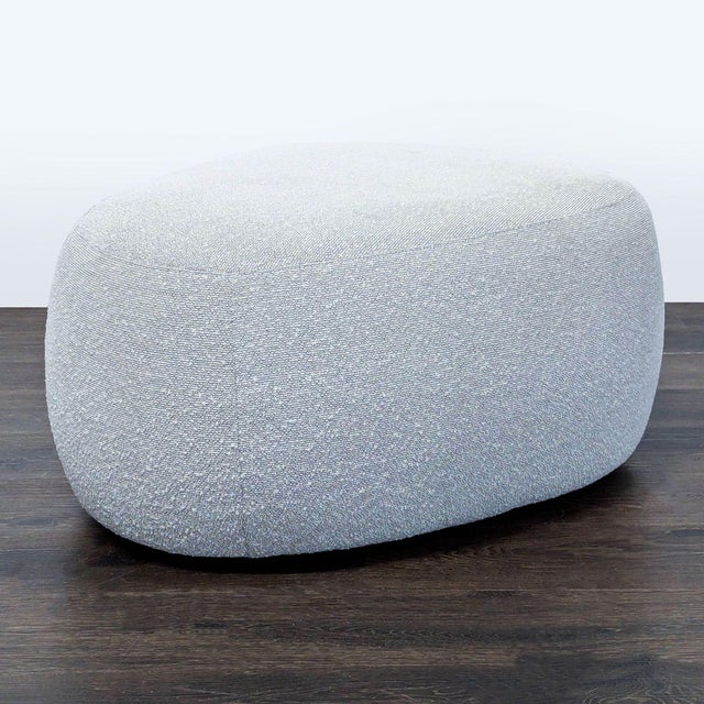 The Asher ottoman is a versatile modern accent piece reminiscent of river stones. Perfect as a coffee table, extra seating...