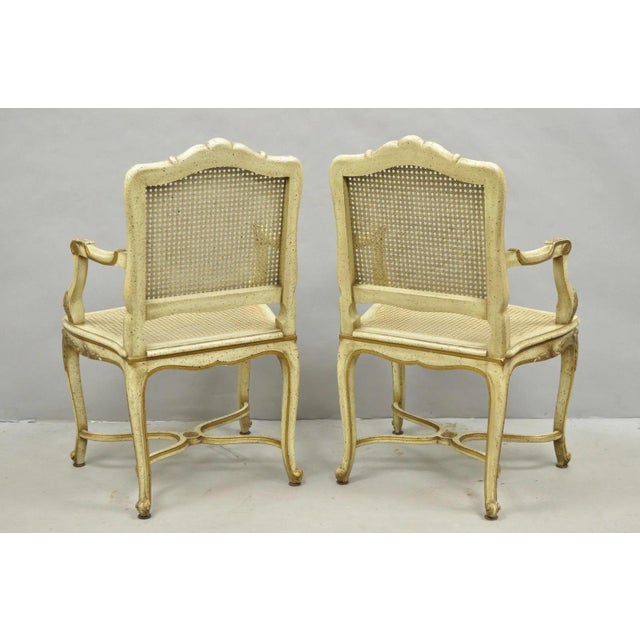 Vintage French Louis XV Style Cream Painted Carved Wood Cane Arm Chairs - A Pair For Sale - Image 17 of 18
