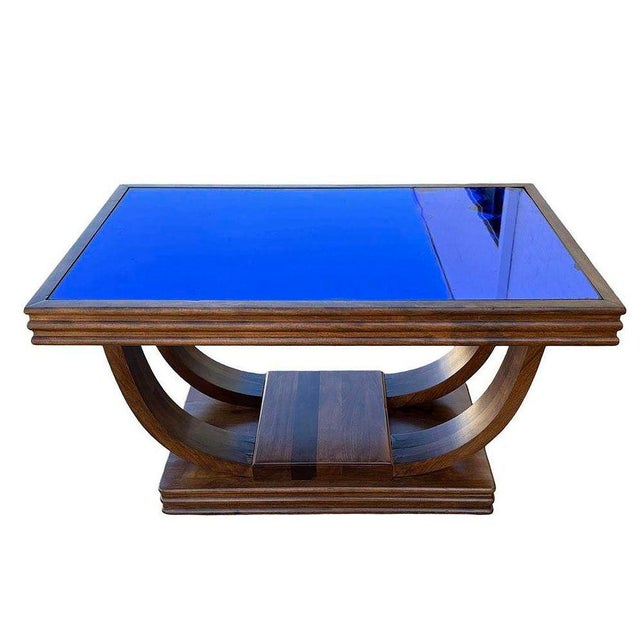 Original Streamline Art Deco Coffee Table with mirrored cobalt blue glass with speed legs luxurious rosewood it has a...