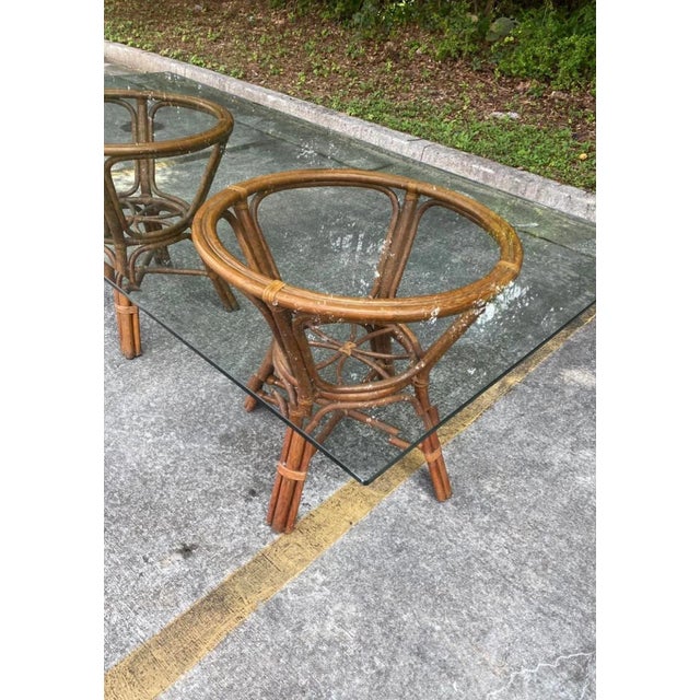 Absolutely beautiful double Bamboo Dining Table. Glass is sturdy and in good condition. White glove delivery available....
