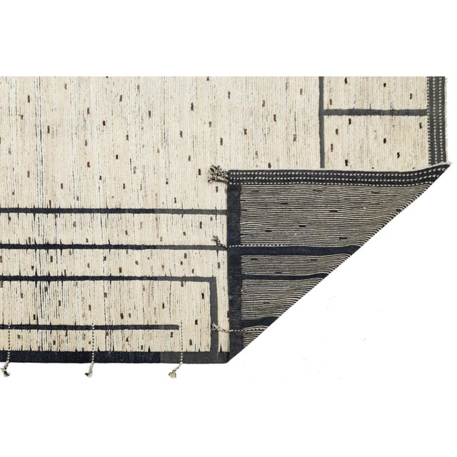 This exceptional modern Moroccan rug is a stunning example of contemporary design infused with traditional weaving...