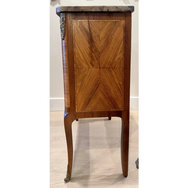 Antique Dutch Marquetry Commode Chest having marble top, two drawers, ivy band and floral & horn wreath marquetry on...