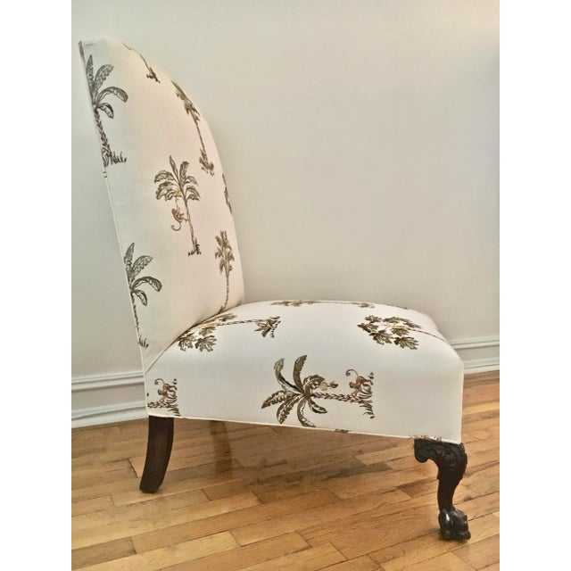 Early 20th Century handcrafted Chippendale style sculptural.Slipper Chair. Fireside Chair. Nursery. Baby. Featuring a...