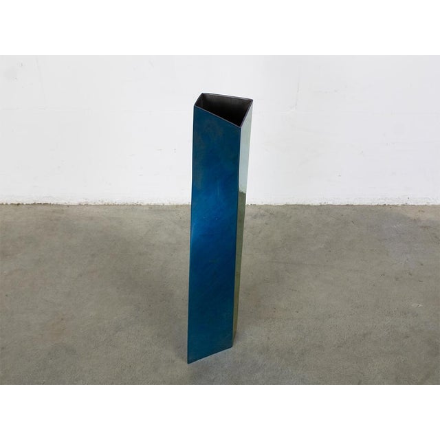 Limited edition vase, nr 111 of 999. polished stainless-steel blue. This piece has an attribution mark, I am sure that it...