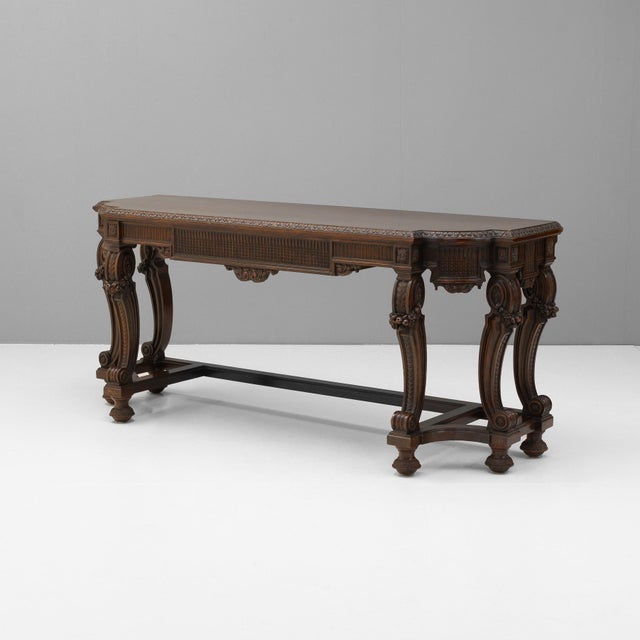 Large walnut console with drawer in frieze on stylised cabriole legs. Circa 1900.
