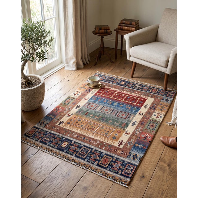 Afghan Qashqai design rug. Hand-knotted in Afghanistan in highland lambswool, after the tribal weavings of southwest...