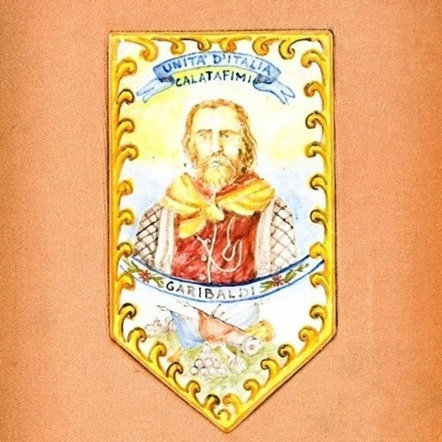 This Garibaldi at Calatafimi is an original decorative majolica object realized in Sicily, Italy by Italian manufacture...