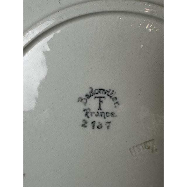 A very beautiful and substantial Art Deco earthenware dinner service by Badonviller, comprising 59 pieces. It features an...