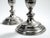 A pair of candlesticks made of clad brass and filled with rosin in Vienna by the Henniger label in the second half of the...