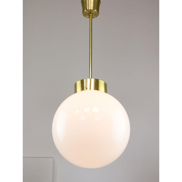 Big opaline globe of 35cm diameter and genuine brass! takes 1x e27 light bulb (not included). A standard e26...
