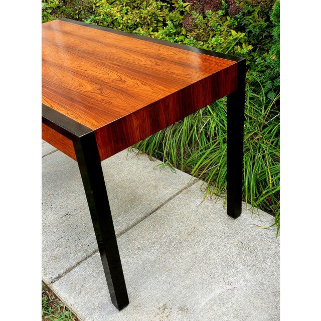 Featured is a mid-century modern 1960's desk by designer Harvey Probber, of linear form in mahogany and bleached rosewood,...