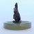 A cold painted bronze study of a hare. Set on an onyx base ring tray. Dimensions: H 12cm, W 12cm Origin: Austrian Date:...
