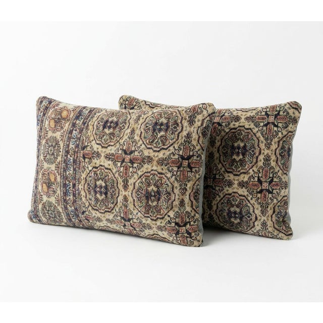 This beautiful 16'' x 24'' pillow cover set was made from authentic Turkish rug pieces. Bright colors of wool adorn the...