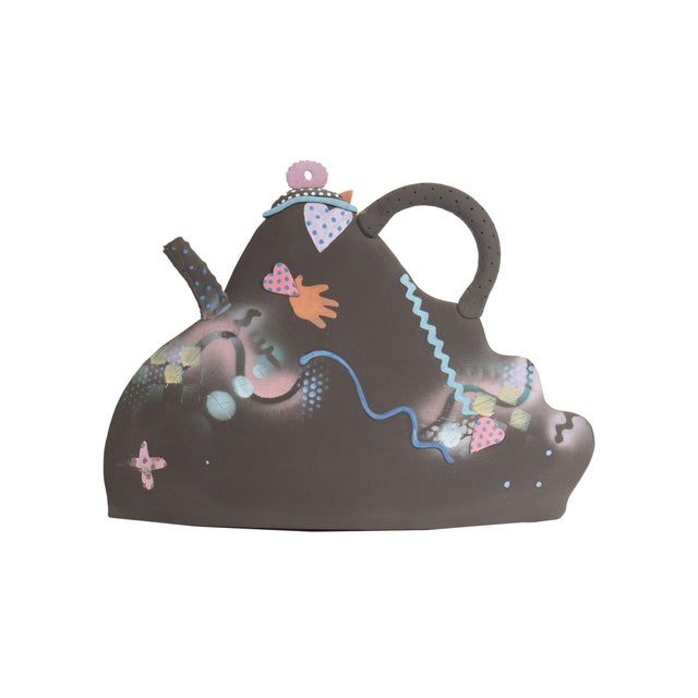 A Postmodern studio pottery teapot sculpture by the American artist Madeline Kaczmarczyk. This ceramic sculpture of a...
