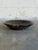 This vintage ceramic plate bowl features an elegant shallow design that seamlessly blends rustic texture with refined mid-...