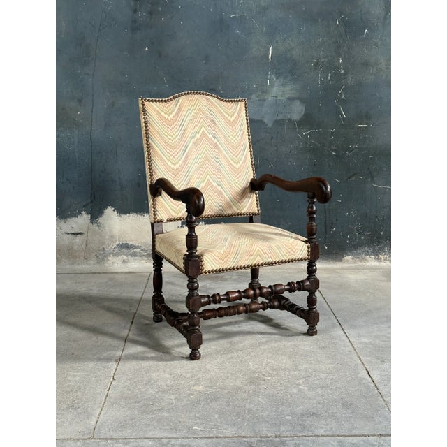 Beautiful 19th century French armchair with great os de mouton carved arms and finely turned legs and stretchers. Great...