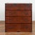 A Japanese Taisho period antique tansu chest from the early 20th century with five drawers and iron hardware. Created in...