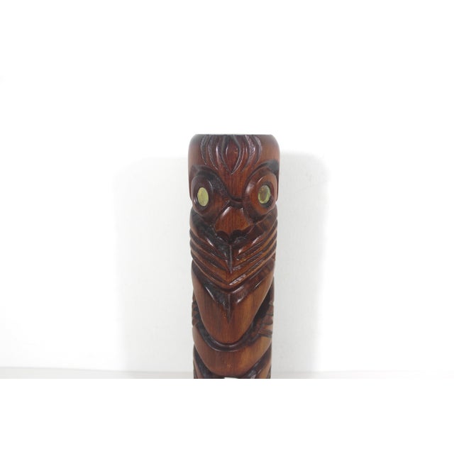 Indigenous Maori wood sculpture with Abalone shell eyes. Folk art from New Zealand. Marked on the back: Carved in Rotorua...