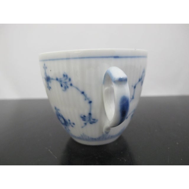 Vintage Royal Copenhagen Denmark, plain blue fluted cup 1/79. Measures 3 3/4" x 3" x 2 3/4" tall. Excellent condition, no...