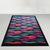 An exceptional and vibrant wool rug designed by the legendary Italian fashion and textile designer Ottavio Missoni, dating...