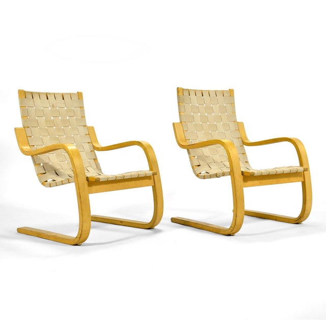 Aalto's 1936 design, the model 406 lounge chair is a perfect example of understated Finnish design. The bent wood...
