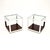 A superb pair of vintage glass and chrome side tables by Merrow Associates. They were designed by Richard Young and made...