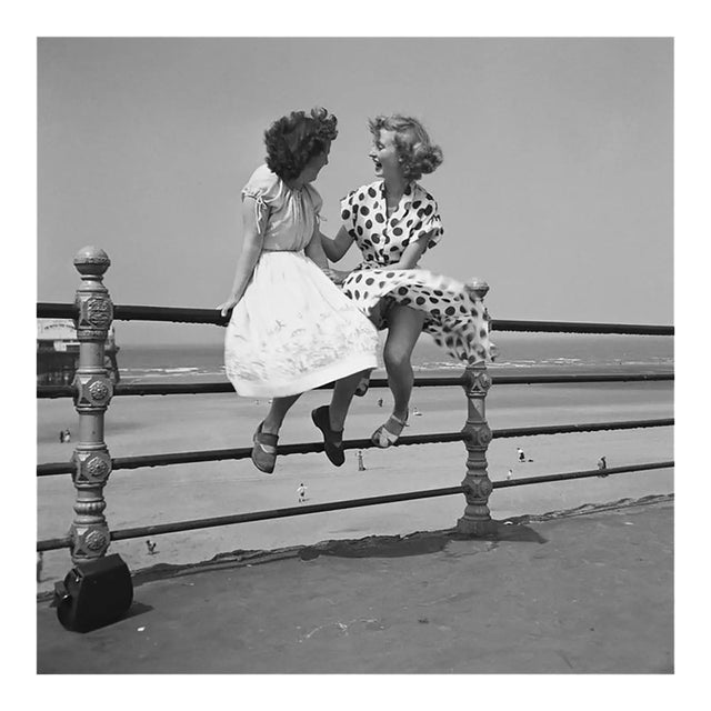 Blackpool Railings Premium Rates Apply. Two women chatting on the railings in Blackpool. The picture was taken by Bert...