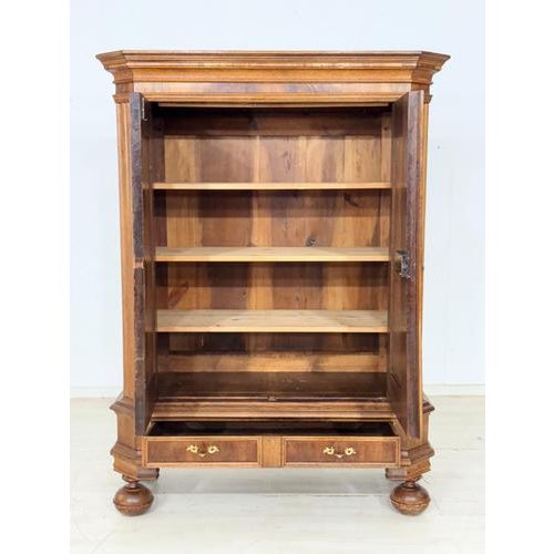 Beautiful antique cabinet from around 1880 in the classic Baroque style. The piece is distinguished by its decorative...