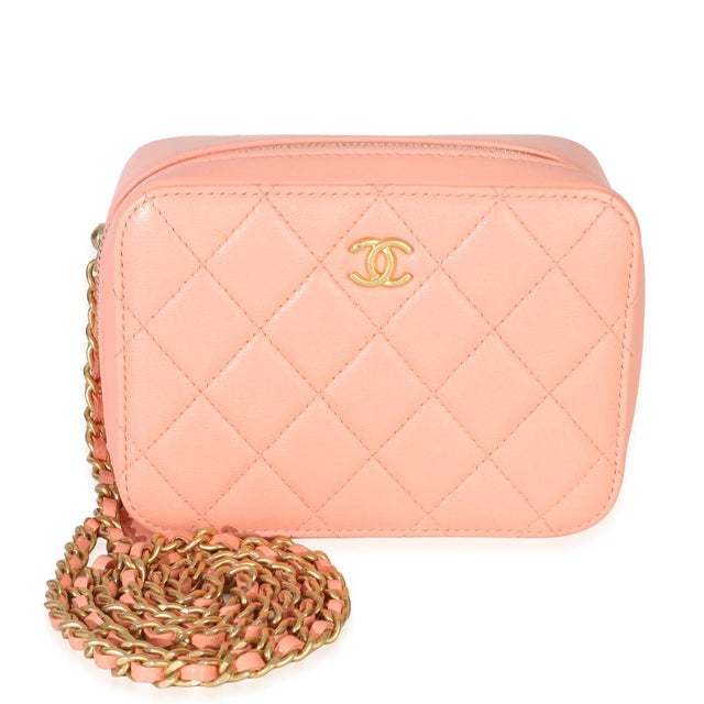 Item #: 154575 Features Interior: Two gussets. Four card slots Dimensions: 5.5 x 4 x 2.25 in Handbag Closure Type: Zip-...