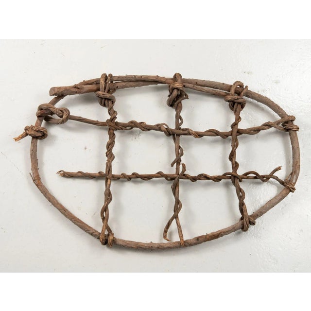 These antique Swedish snowshoes showcase craftsmanship and a timeless design. Skillfully handcrafted from lattice woven...