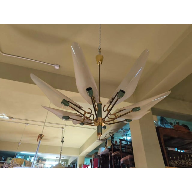 Sputnik Glass Chandelier, 1960s, in Very Good conditions. Designed 1960 to 1969 Up to 250V (Europe/UK Standard).The wiring...