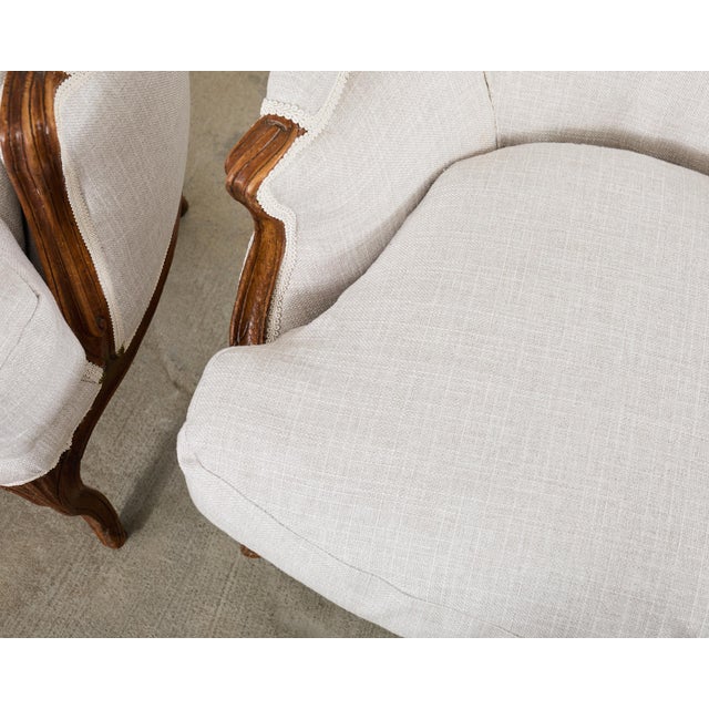 Pair of French Louis XV Style Walnut Bergeres With Linen For Sale - Image 15 of 18