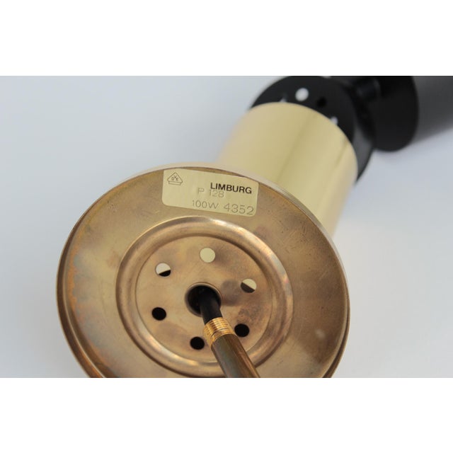 Pendant light made of brownish smoked glass and brass, manufactured in germany by limburg in the 1970s very good...