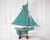 Carved in wood and named 'Kangaroo,' this English pond yacht dates to the twentieth century and is rigged as a gaff...