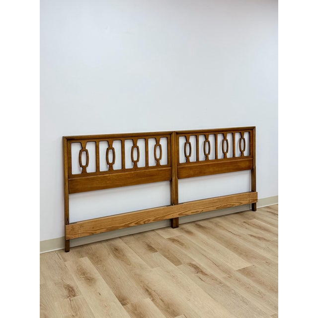 This vintage king headboard in the STYLE Drexel's Meridian collection is a genuinely collectible example of mid-century...