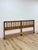 This vintage king headboard in the STYLE Drexel's Meridian collection is a genuinely collectible example of mid-century...