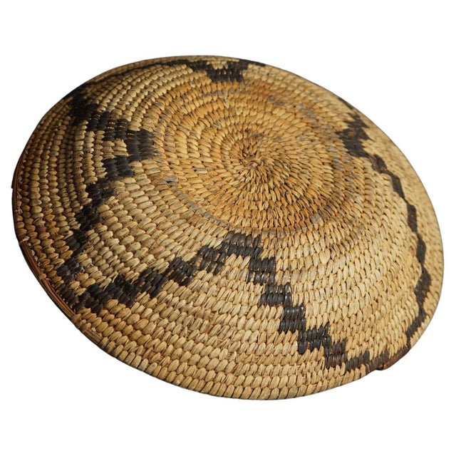 An antique Native American Southwest Navajo Indian low bowl offers decorated woven reed construction, Circa 1920 Measures-...
