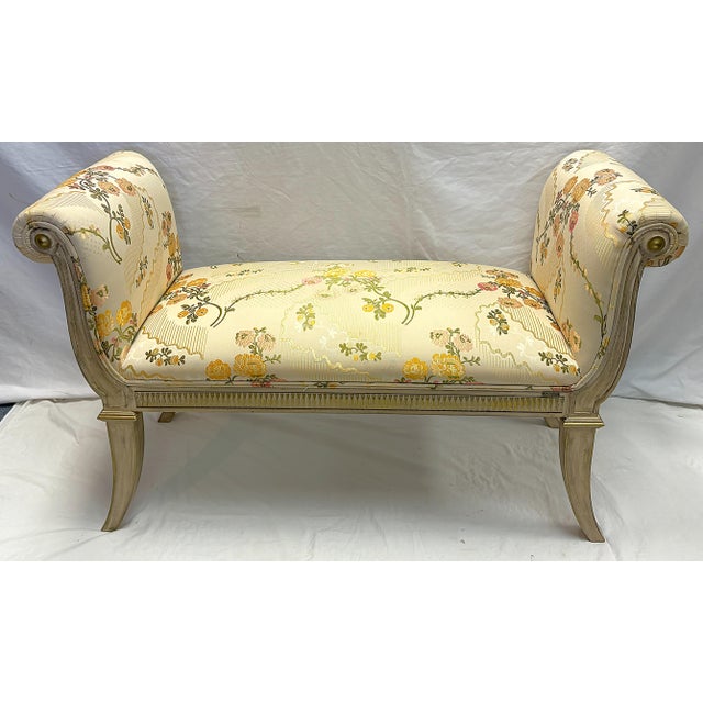 Pretty vintage upholstered bench made in Spain by Francisco Hurtado. The finely crafted piece features rolled arms on a...