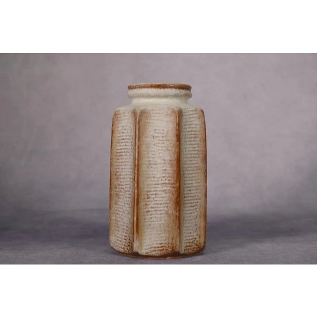 Brutalist Ceramic Vase N°7832-25, West Germany, 1970s, in Good conditions. Designed 1970 to 1979 This piece has an...